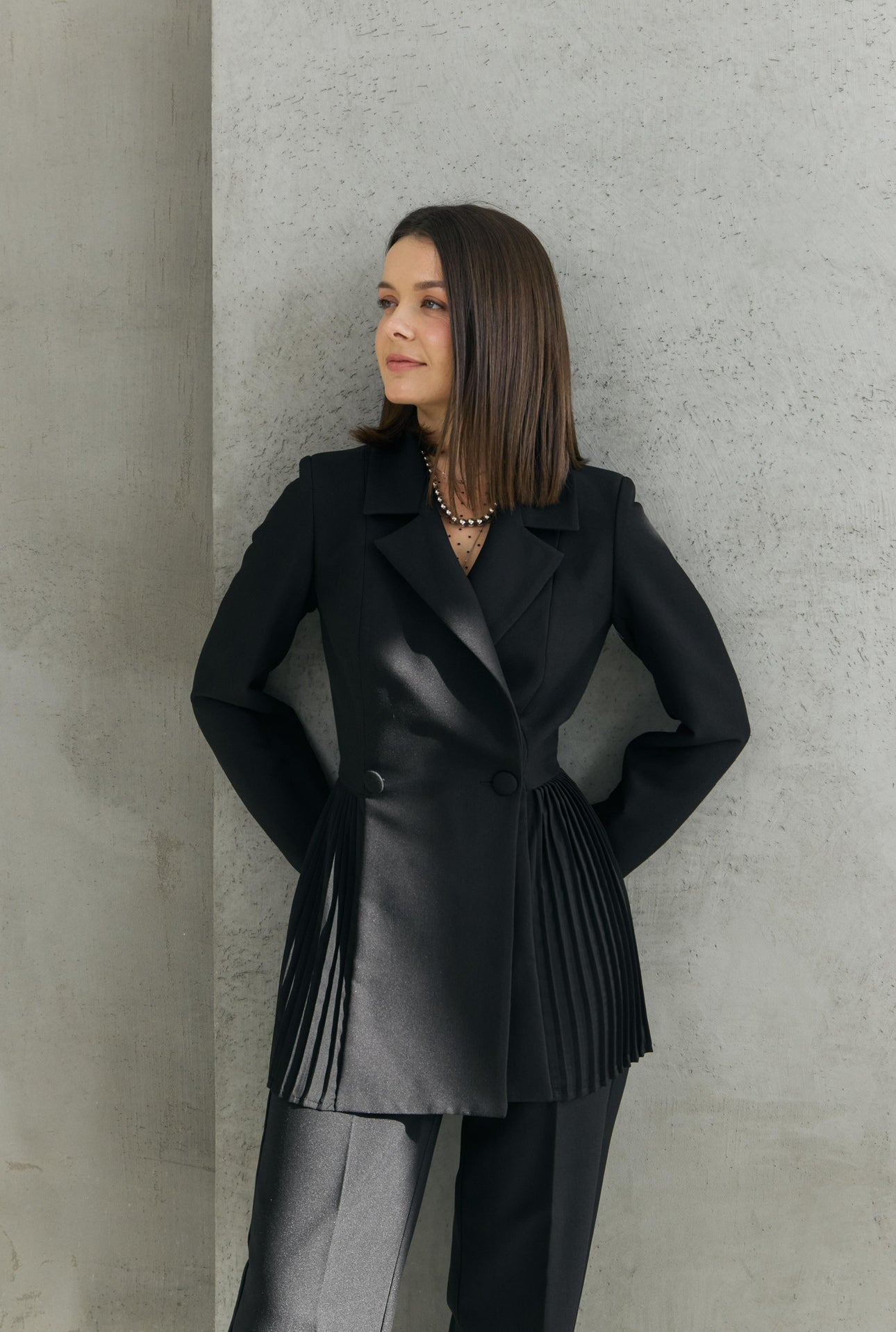 Dominika's black pleated jacket