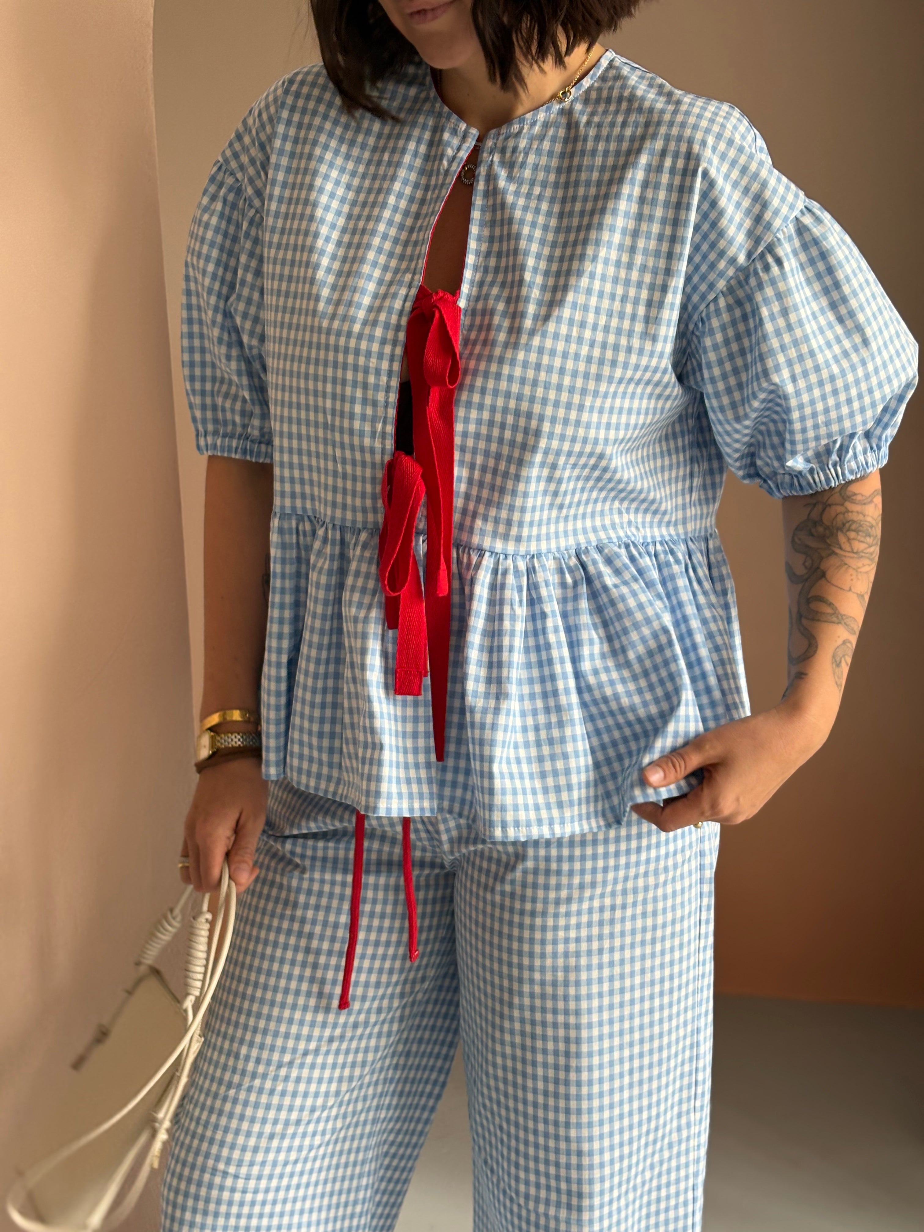 A blouse made from 100% cotton