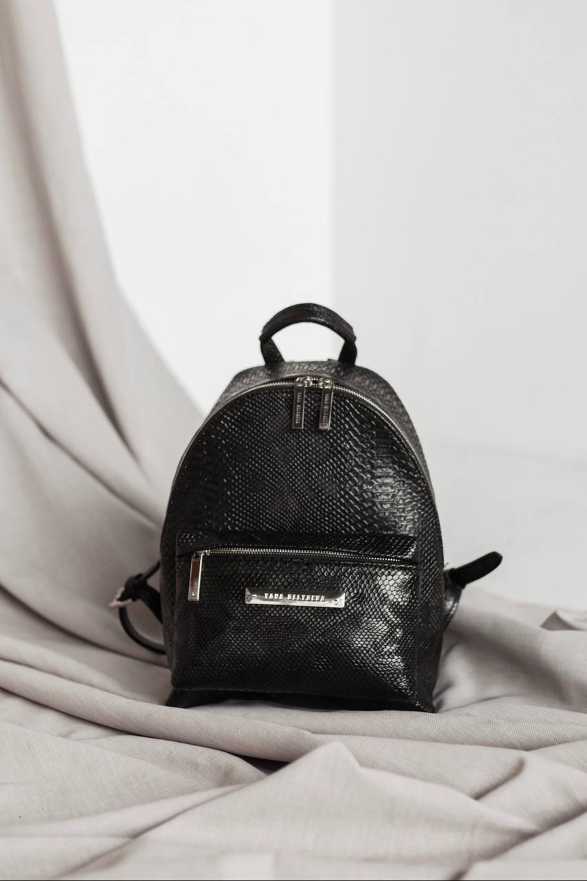 black leather snake backpack Gucci Grained King Drawstring | myGemma their sinuous bodies adorned with patterns inspired by the beauty of cathedral architecture Amy Miller Faux Leather Snake