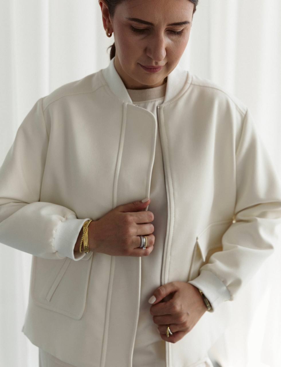 Bomber jacket with a pleated back